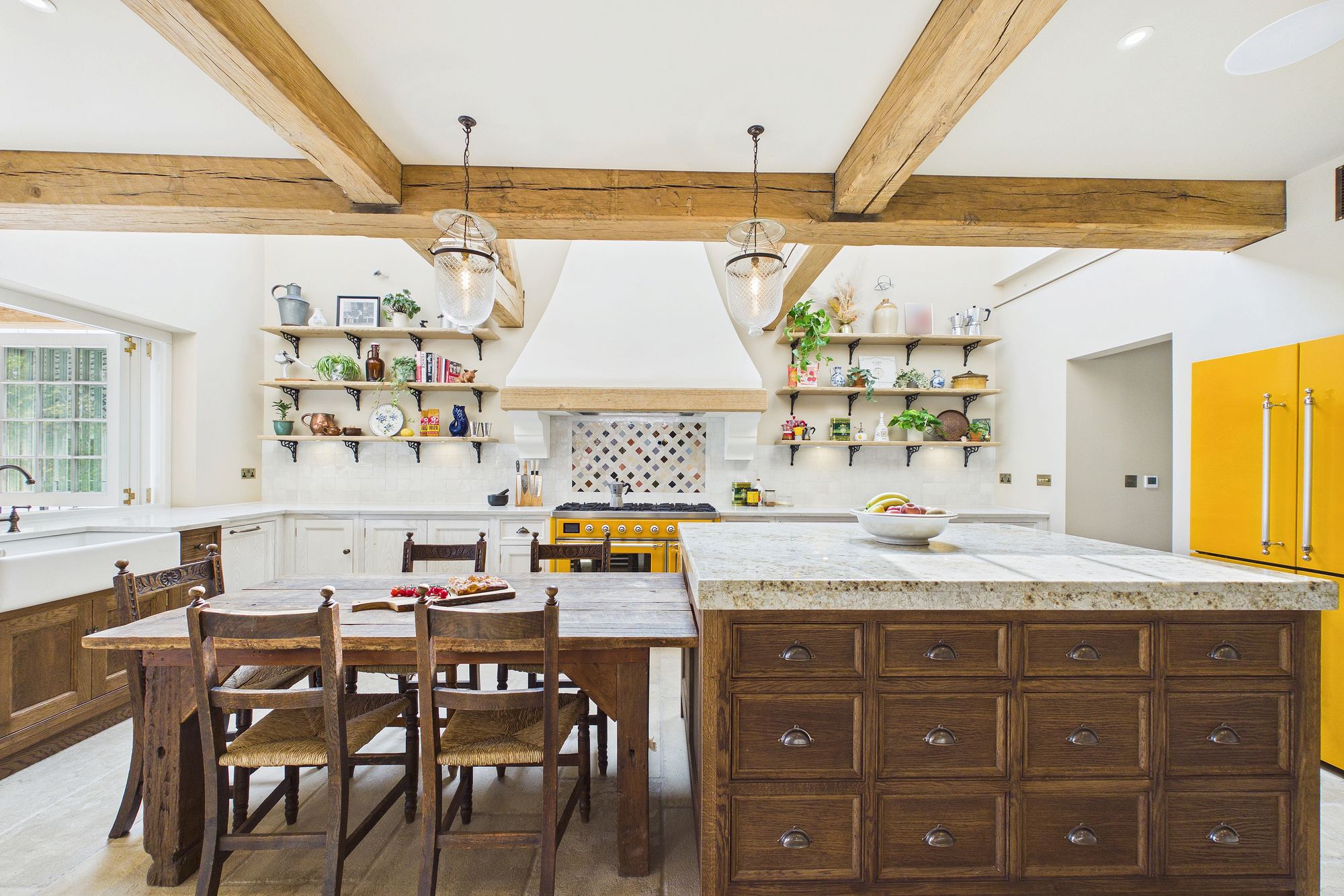 Open-plan kitchen with oak and granite island