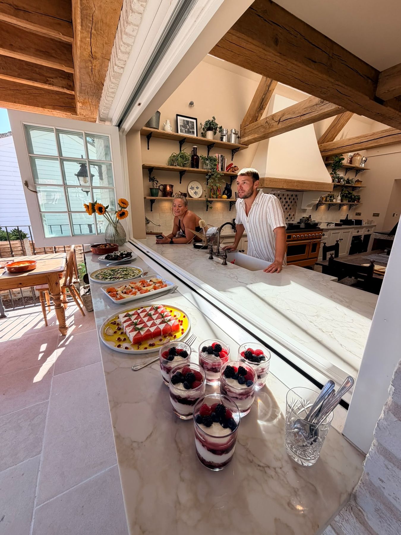Brunch laid out along the kitchen pass to the terrace