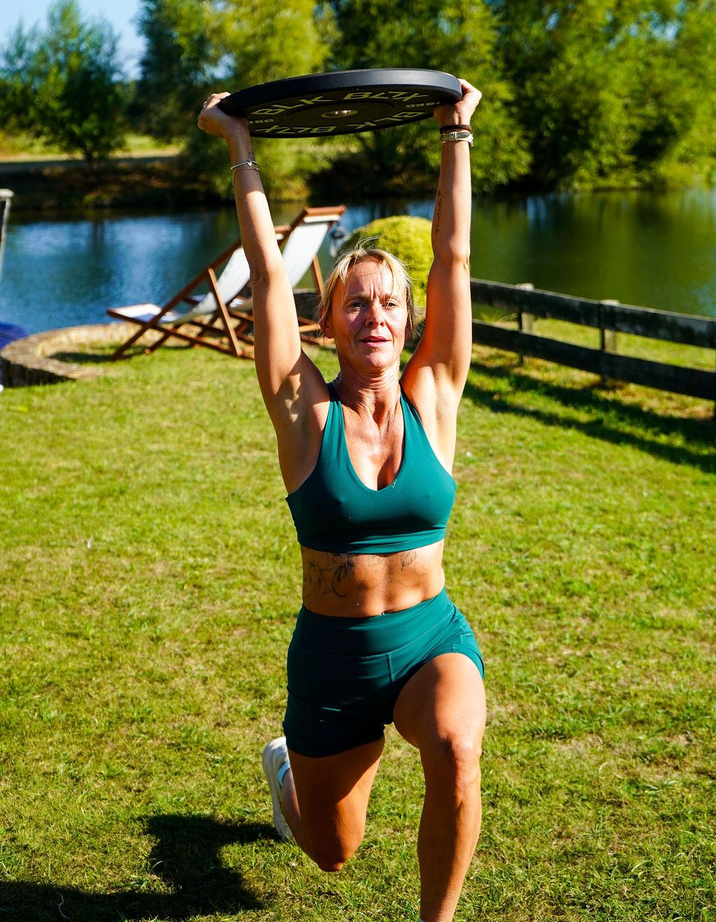 Overhead lunges on the lawn
