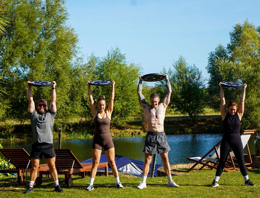 Overhead press beside the water